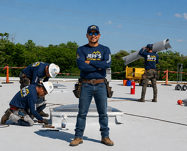 Jeff's Roofing commercial crew working on a flat membrane roof