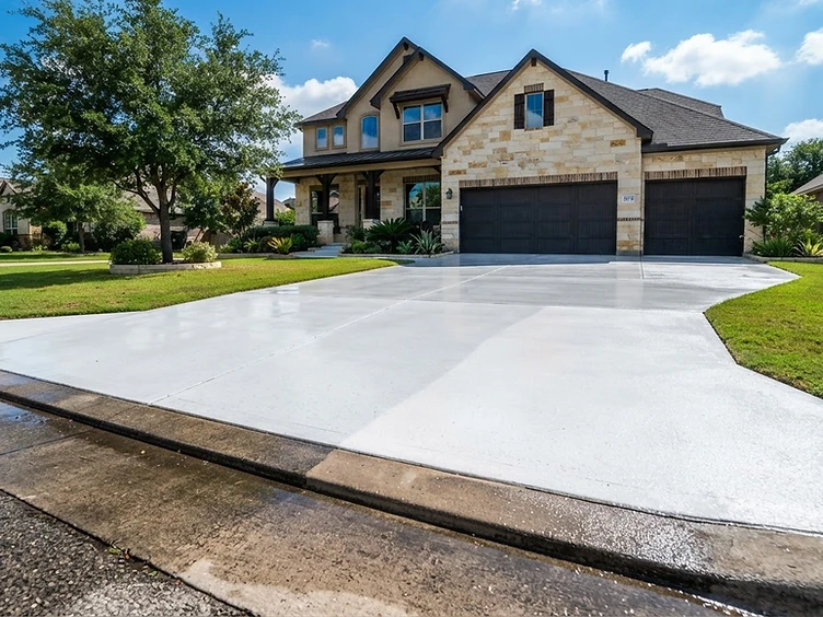 Driveway before and after pressure washing