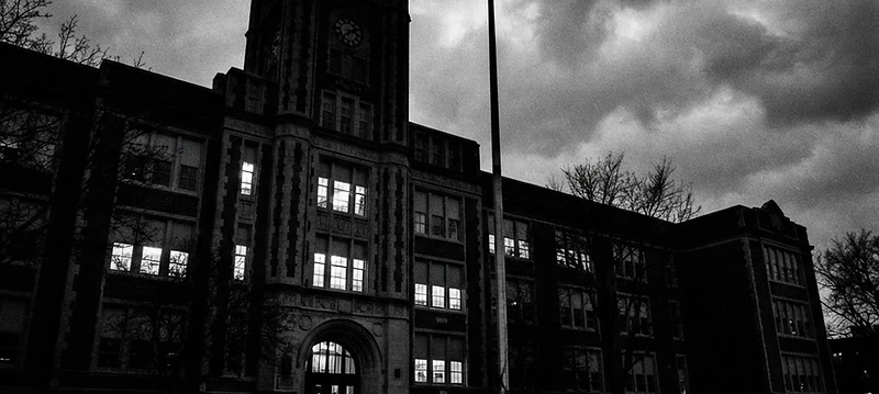 Harding High School building at dusk