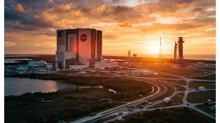 Kennedy Space Center at sunset, showcasing industrial scale.