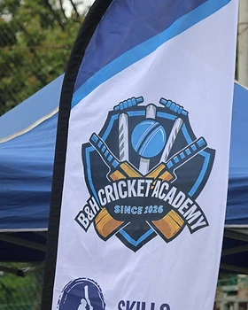 The B&H Cricket Academy branded feather flag