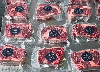 GFS Rioplatense Gold Box open export carton with vacuum packed frozen beef from Argentina