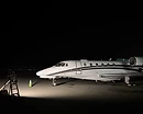 AeroForm aircraft window cleaning — private jet cockpit windows and windshield polished on the apron at night at Monterey Regional Airport