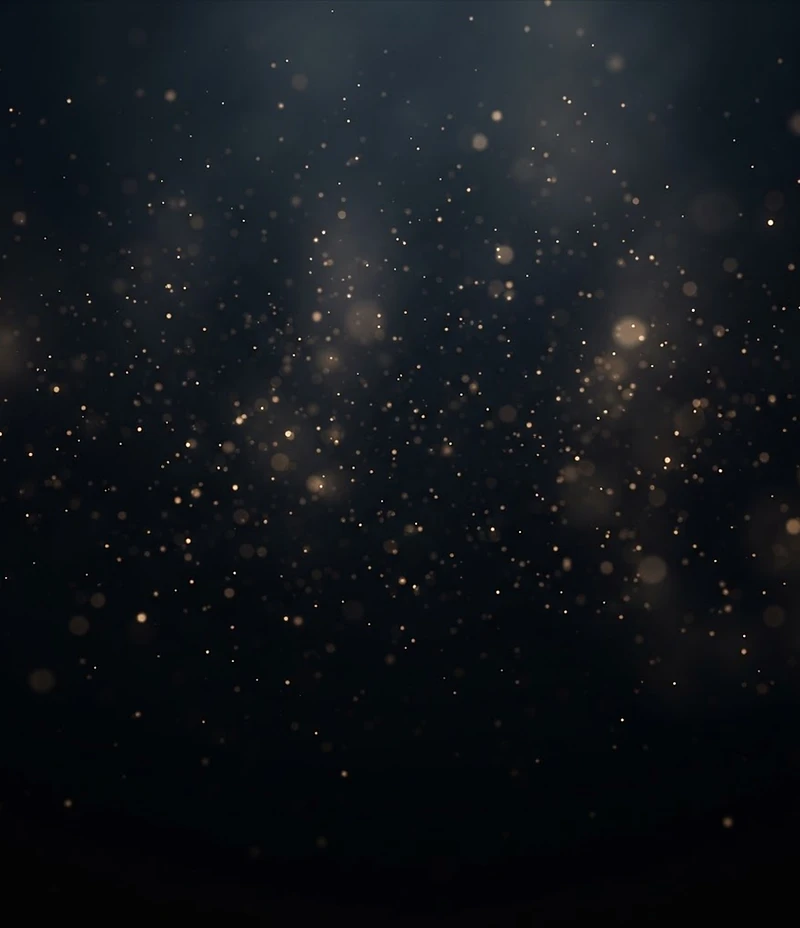Dark atmospheric night sky with golden light particles