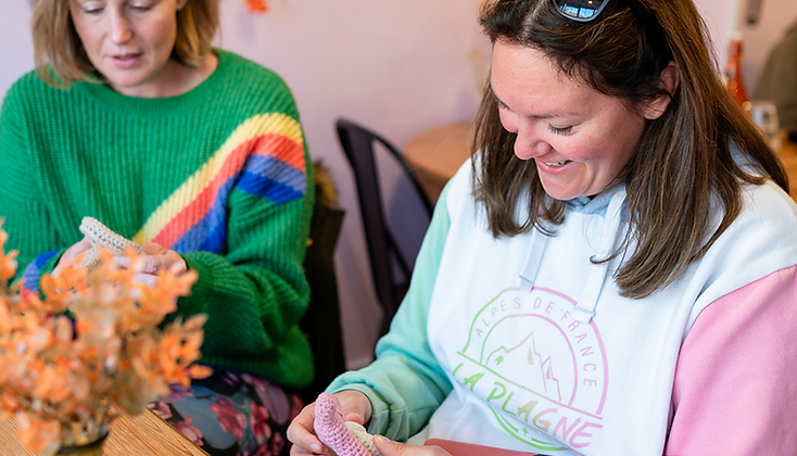 Community health workshop with women sharing tea and conversation