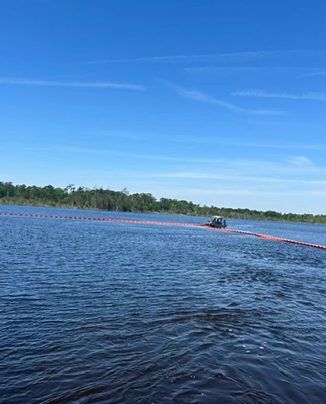 Waterborne containment deployment