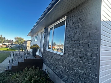 Finished residential siding, stone and exterior trim project