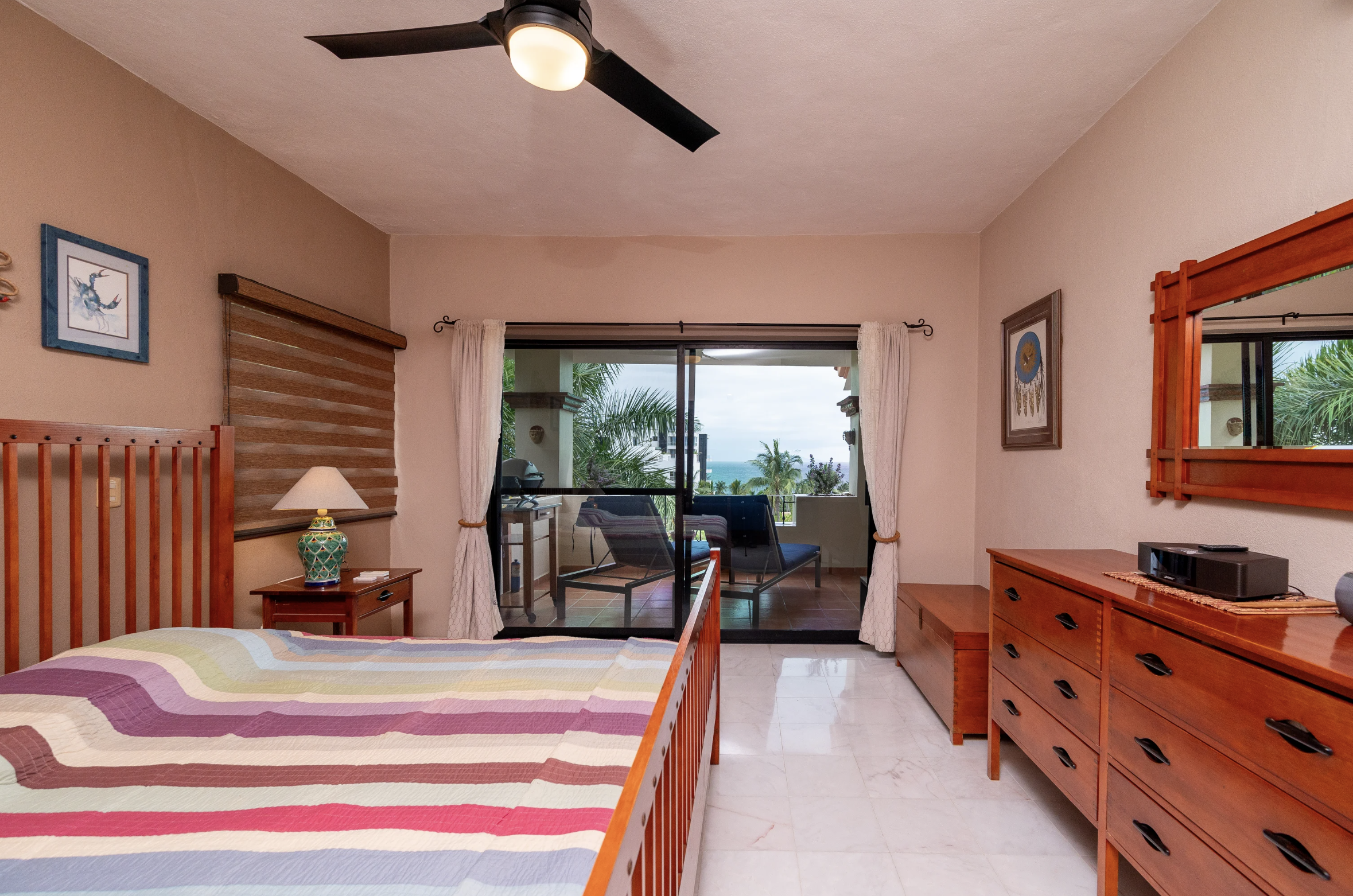 Master bedroom with balcony ocean view