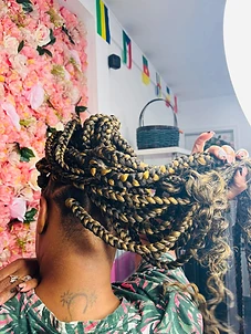 Layered braids with blended highlights in the salon