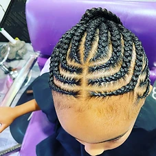 Concentric curved cornrows meeting at a central part
