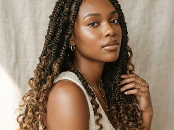 Portrait of long passion twist braids with soft curly ends
