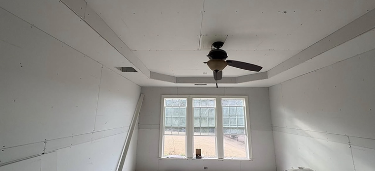 Drywall installation in progress