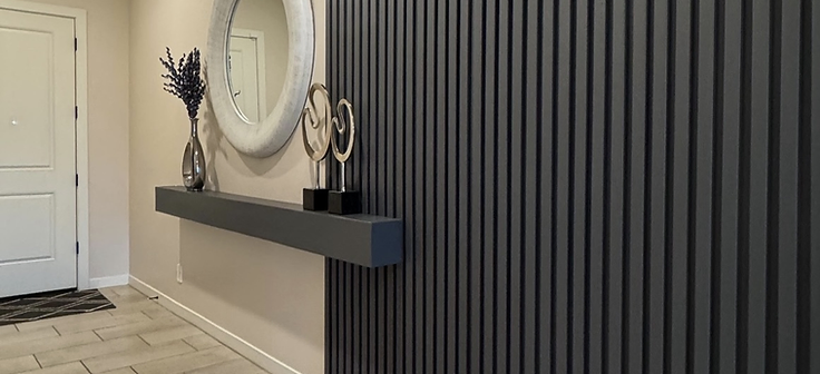 Finished entryway with slat accent wall