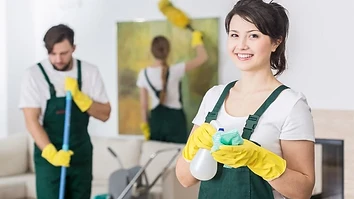 Professional cleaning team at work in a modern interior