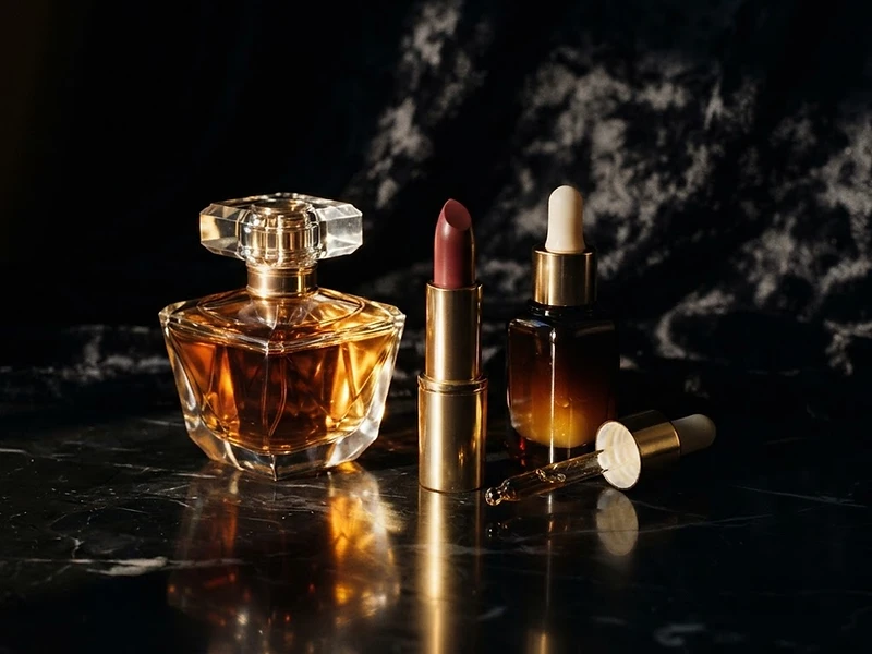 Luxe cosmetics on black marble