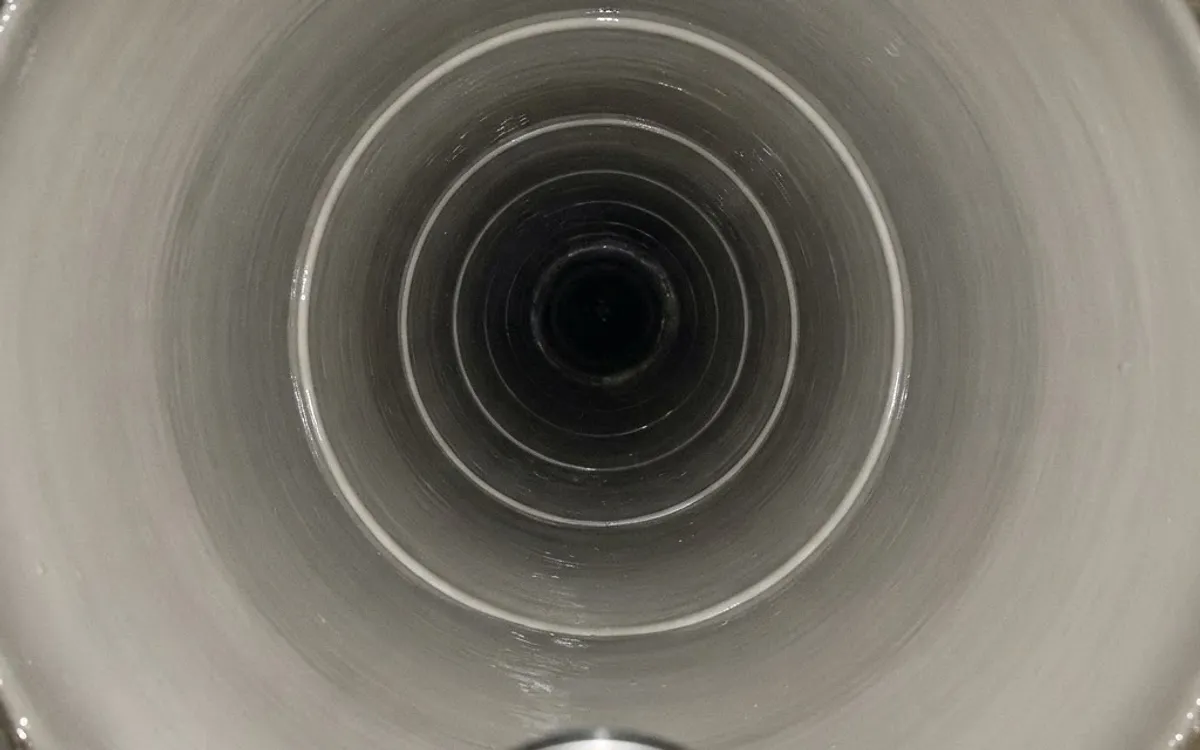 Inside of a relined sewer pipe showing the smooth new liner