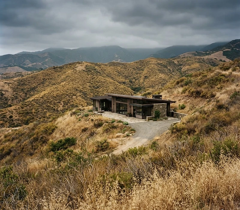 California hillside home in dry landscape