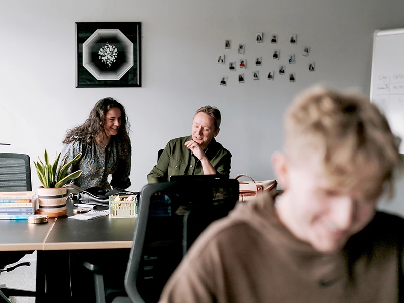 Big Motive team collaborating in the studio