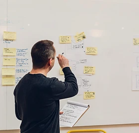 Team members in discussion during a meeting