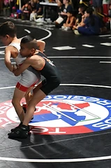 Standing clinch at a TX USA Wrestling South Region event