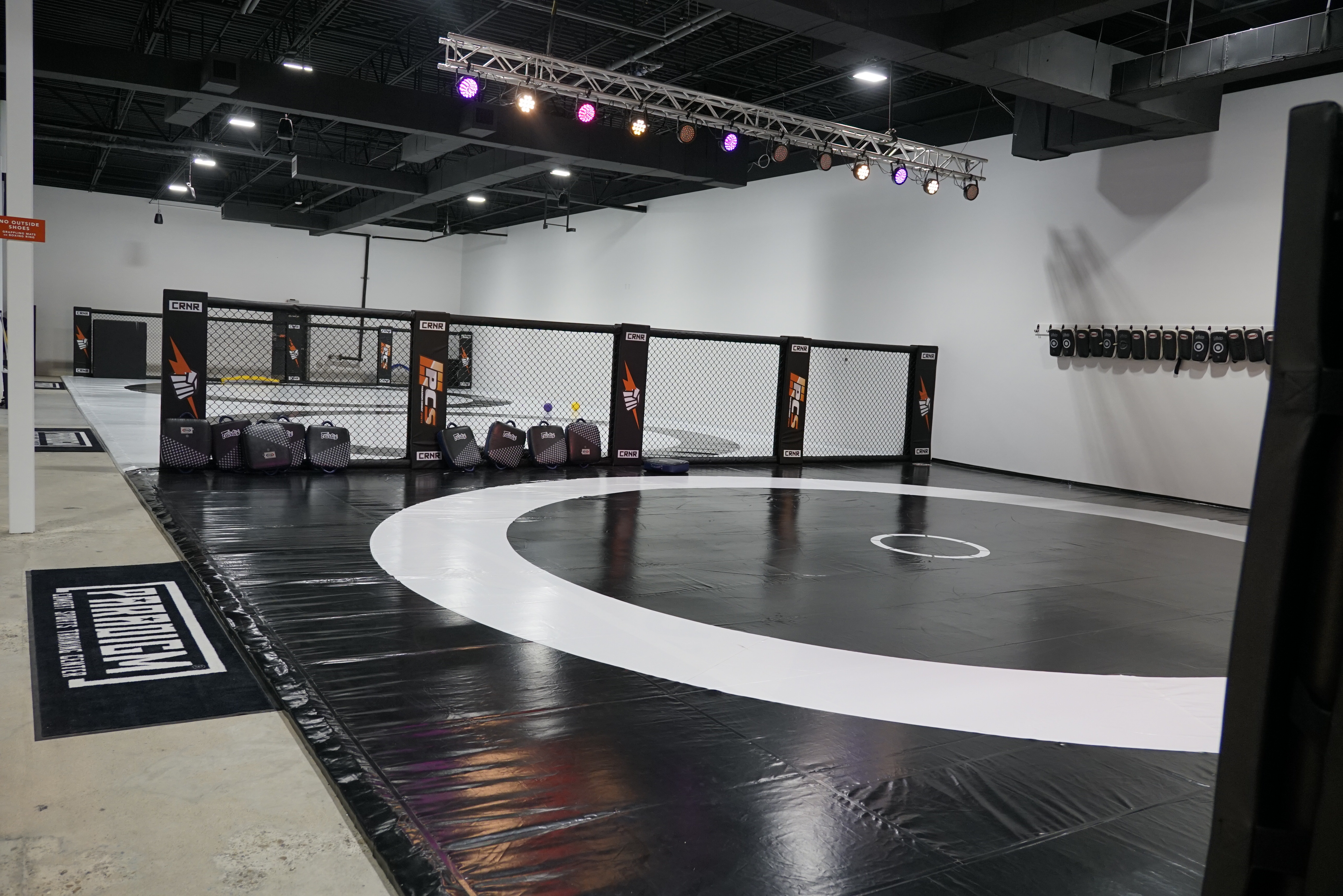 Paradigm® grappling cage with branded mat