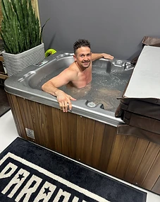 Paradigm® cold plunge tub with athlete recovering post-training