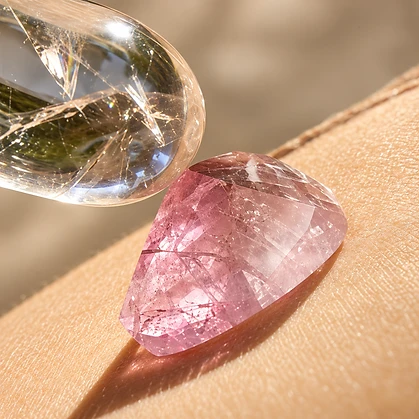 A quartz wand drawing the piezoelectric effect from a faceted crystal resting on the skin