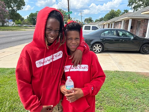 Two young people from Providence Road posing together