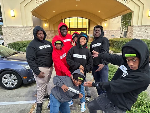 A group of Providence Road youth gathered together outdoors