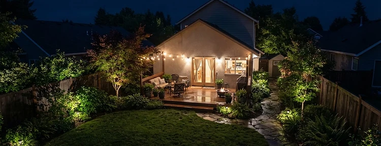 Clear low-light night vision view of a Portland backyard from a security camera