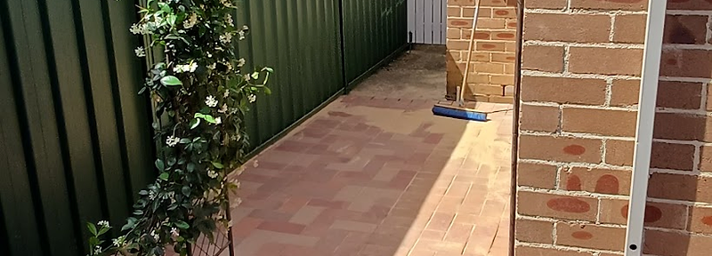 Finished brick paving side path