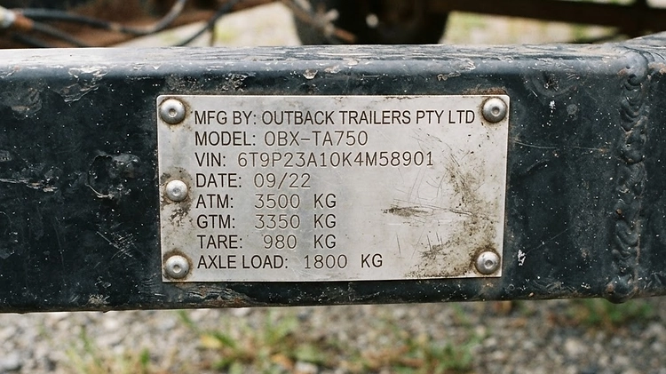 Trailer VIN sticker showing GVWR and GAWR ratings