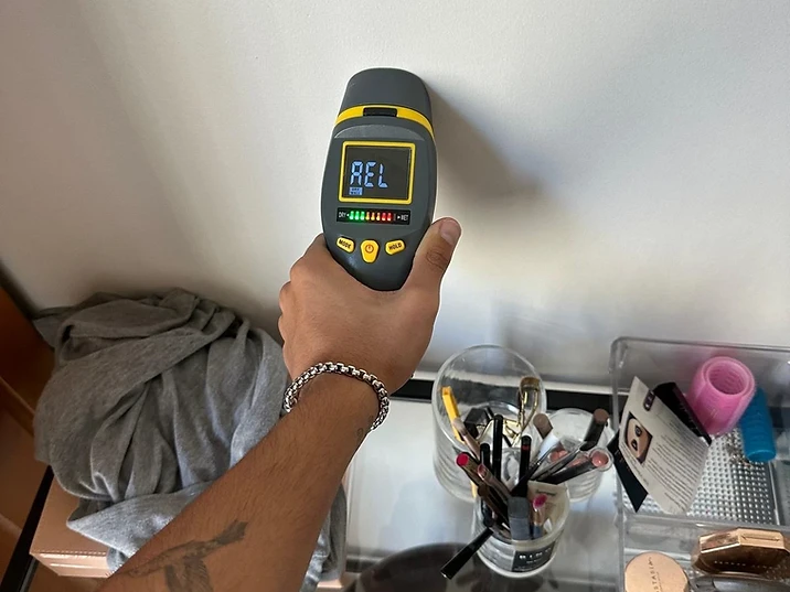 Air sampling equipment and mold testing kit positioned in a room