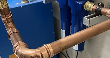 Installed air compressor filtration and copper pipework system