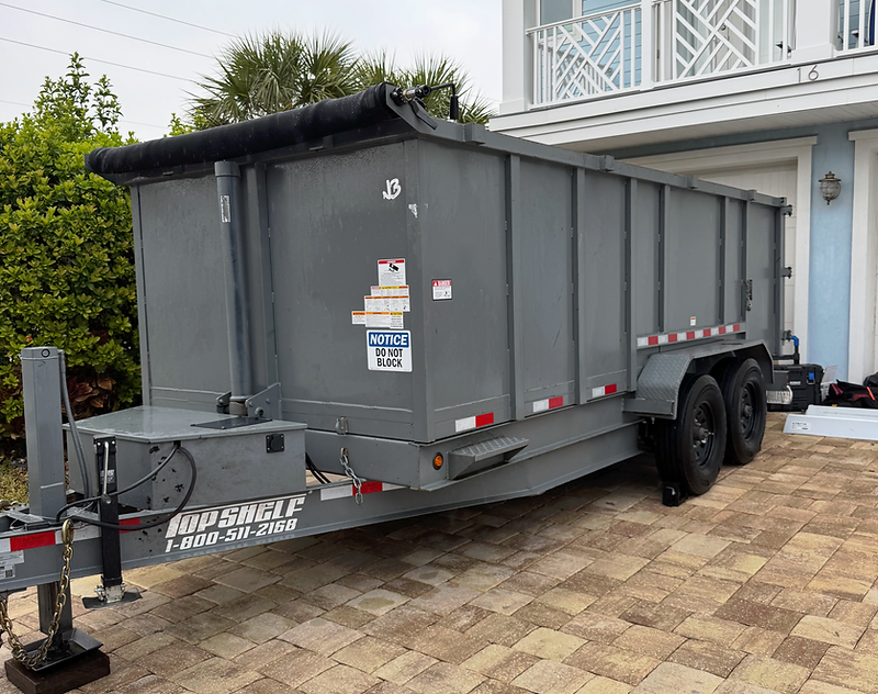 Junkez roll-off dumpster delivered to a Jacksonville residential driveway