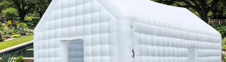 Illustration of a white inflatable wedding pavilion with quilted chambers on a manicured lawn