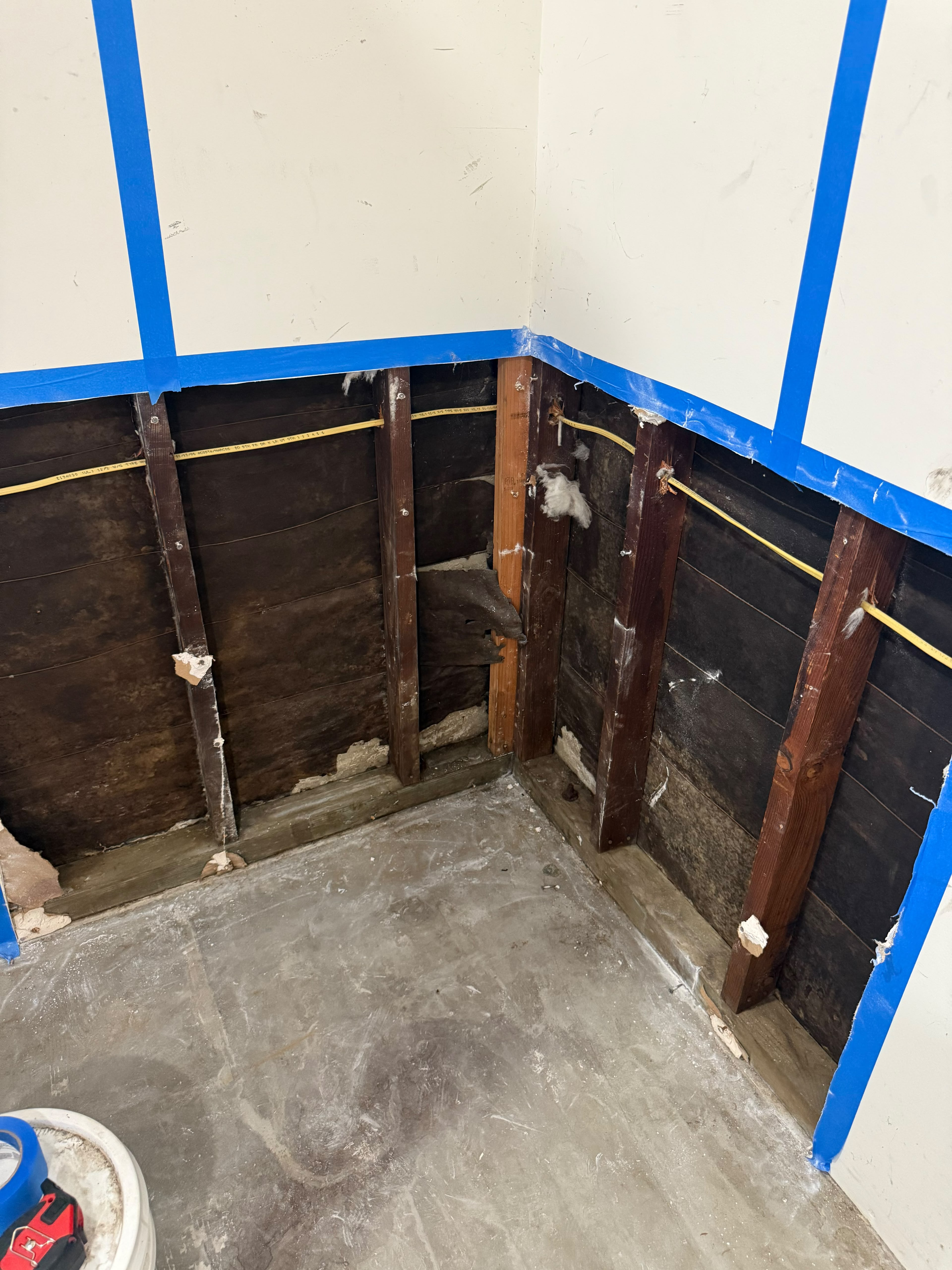 Water Damage — Wall Cavity with Stained Studs