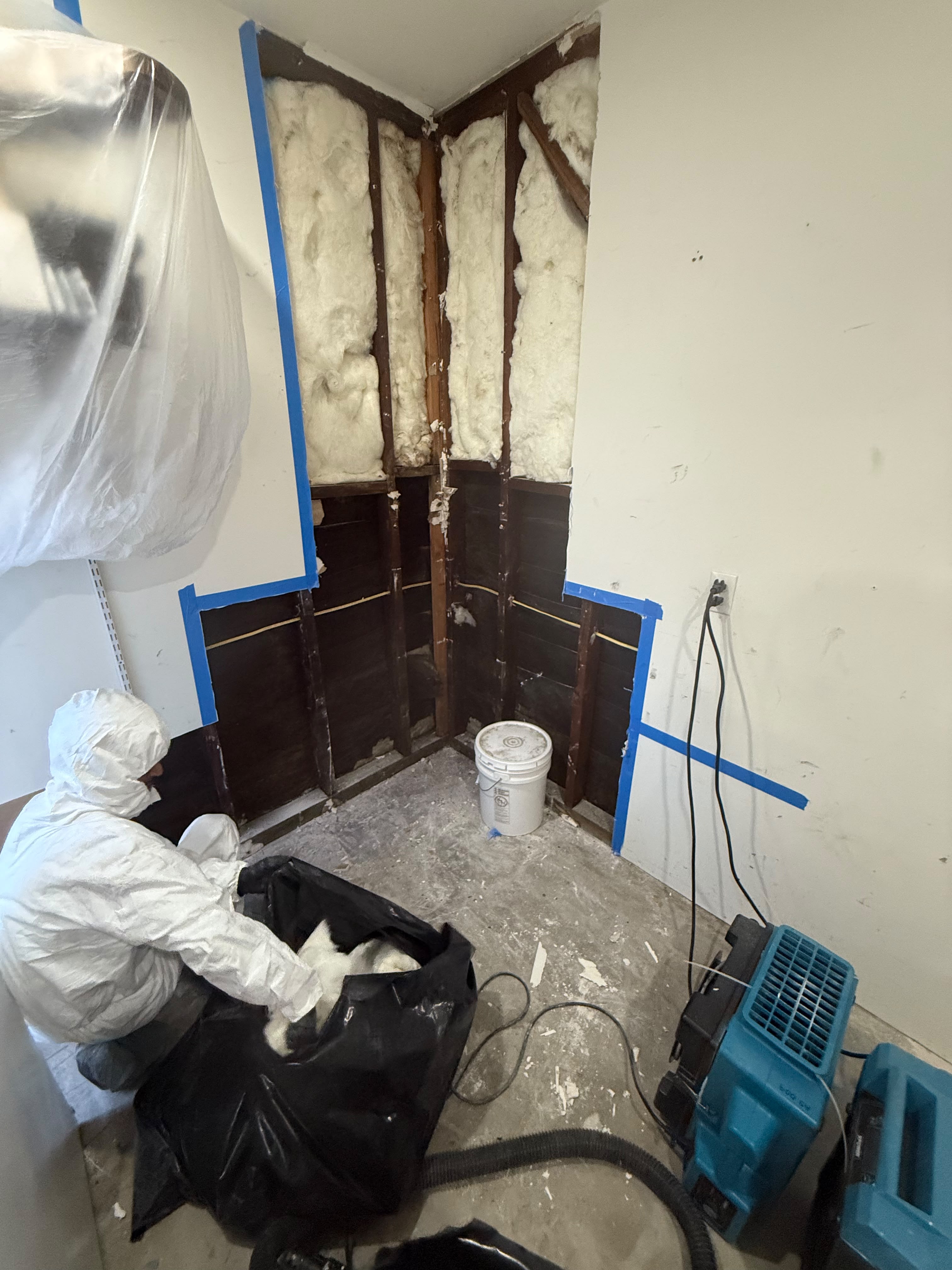 Water Damage — Insulation Removal by Technician — property restoration and reconstruction project by Save Pro Restoration in Los Angeles