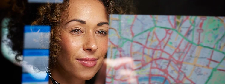 Analyst reviewing community safety data on a map