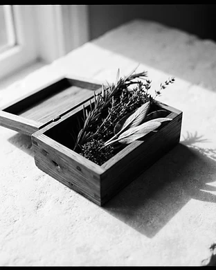 Mini natural wood box with fresh herbs