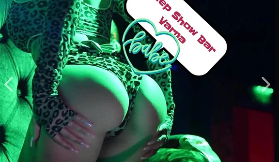 PeepShow Bar Varna performer in green stage light