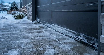 How to Stop a Frozen Garage Door From Sticking to the Driveway This Winter