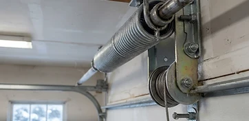 Why Cleveland Garage Door Springs Snap in the Cold — and How to Prevent It