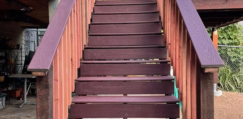 Completed wood deck staircase by D Global Construction