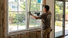 Close up of a modern, energy-efficient window frame installed in a residential home exterior.