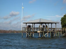The covered boathouse with racked shells