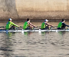 Hands on the oars before a race