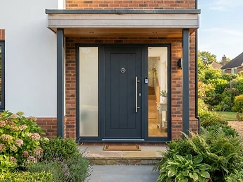 Simple Window Solutions — attractive UK home entrance with glazed side panels