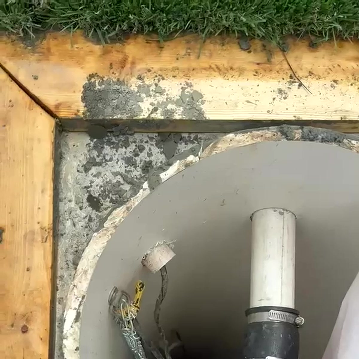 Waterproofing drain basin set in concrete slab with wooden framing and PVC pipe by Noble Waterproofing in Granada Hills CA