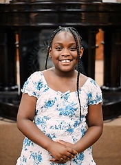 Young girl smiling in front of the church pulpit